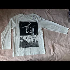 White long sleeve skateboarding graphic t-shirt